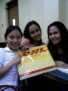 Ayl, Jeel and Peji, with the package from Macau